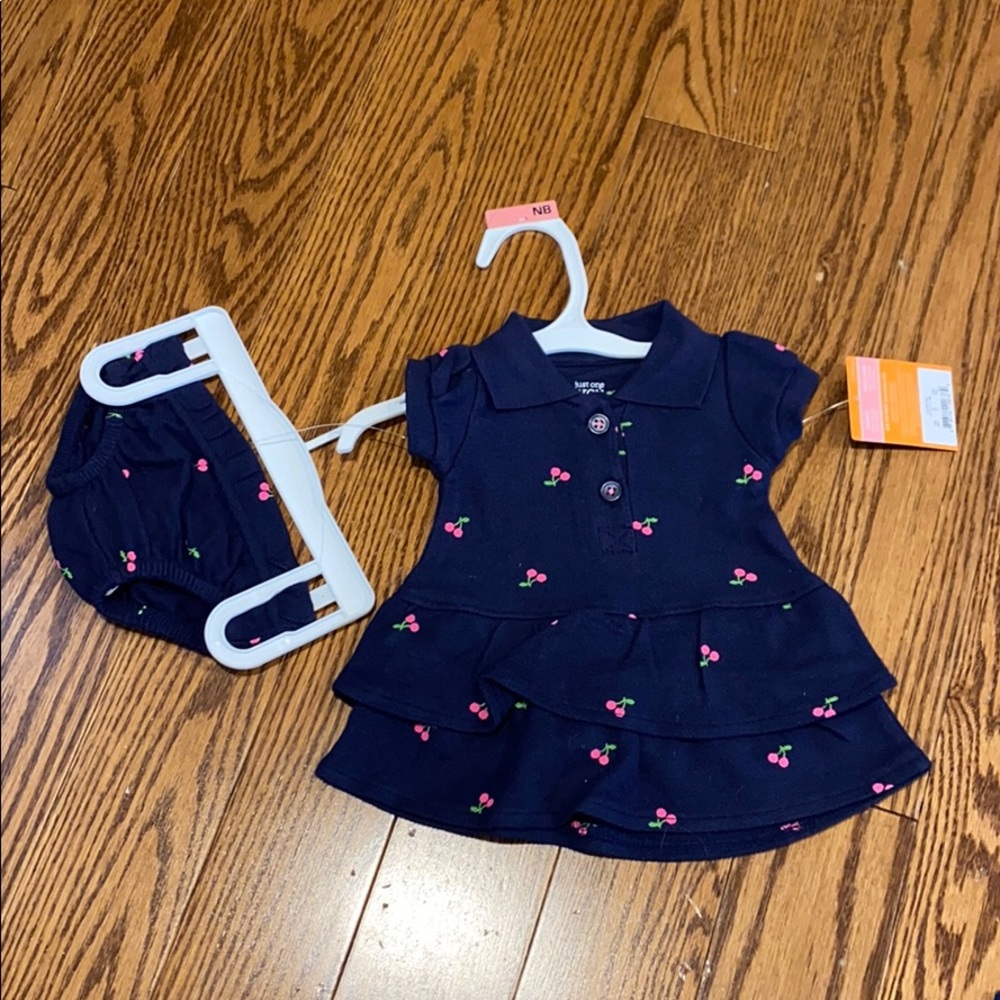 Newborn sized dress - Carter’s